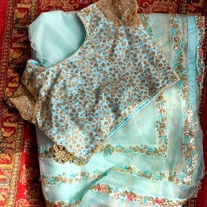 Gorgeous Brand New Net saree with blouse and petticoat